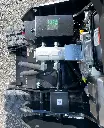 vue du dessus des chenilles d'une mini chargeuse mc306 de chez chargeur plus.webp